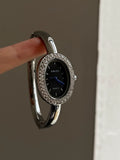Oval Vintage Gold Bracelet Watch - Silver Band Black Dial (Crystal Bezel, Stick Markers) [SO0XYNC7]
