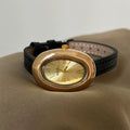 Vintage Inspired Bangle Watch - Black Leather / Gold Case / Gold Dial / Roman Numerals [HN6173TD]