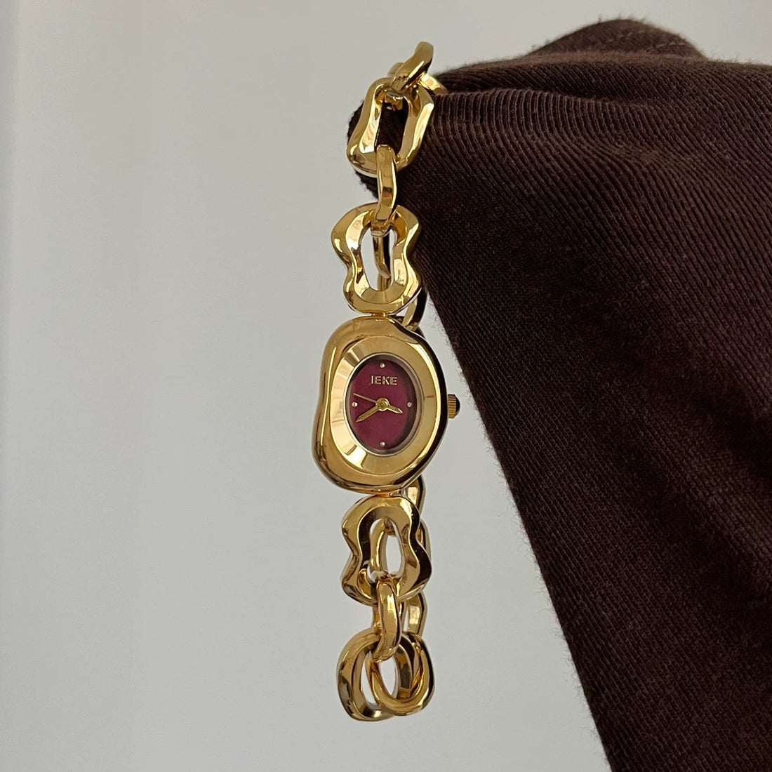 Irregular Hollow Bracelet Watch - Gold Band with Red Dial [L992KMIT]