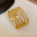 Cyra Statement Cuff Bracelet - Gold Intertwined Cuff [PFCHE9ZF]