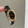 Vintage Inspired Bangle Watch - Black Leather / Gold Case / Black Dial / Roman Numerals [PLTPYQJE]