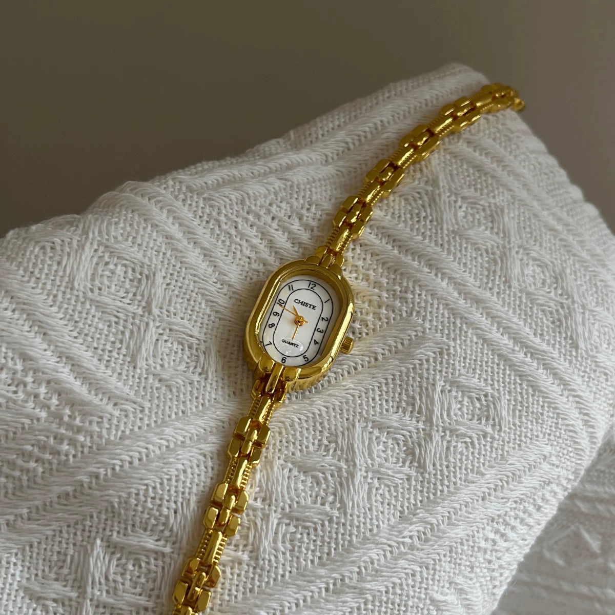 Oval Mother-of-Pearl Bracelet Watch - Gold Band with White Face [RTHTFNGI]