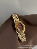 Liba Snakehead Quartz Watch - IEKE Dove Egg 723 Red Dial Gold Steel Band [VJPDAAOE]