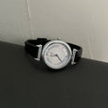 Marta Mid-Century Round Watch - Black Strap, Silver Frame, White Face [I1IUISR0]