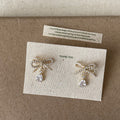 Kelcie Pearl Bow Drop Earrings - Gold Earrings [X0EPLONG]