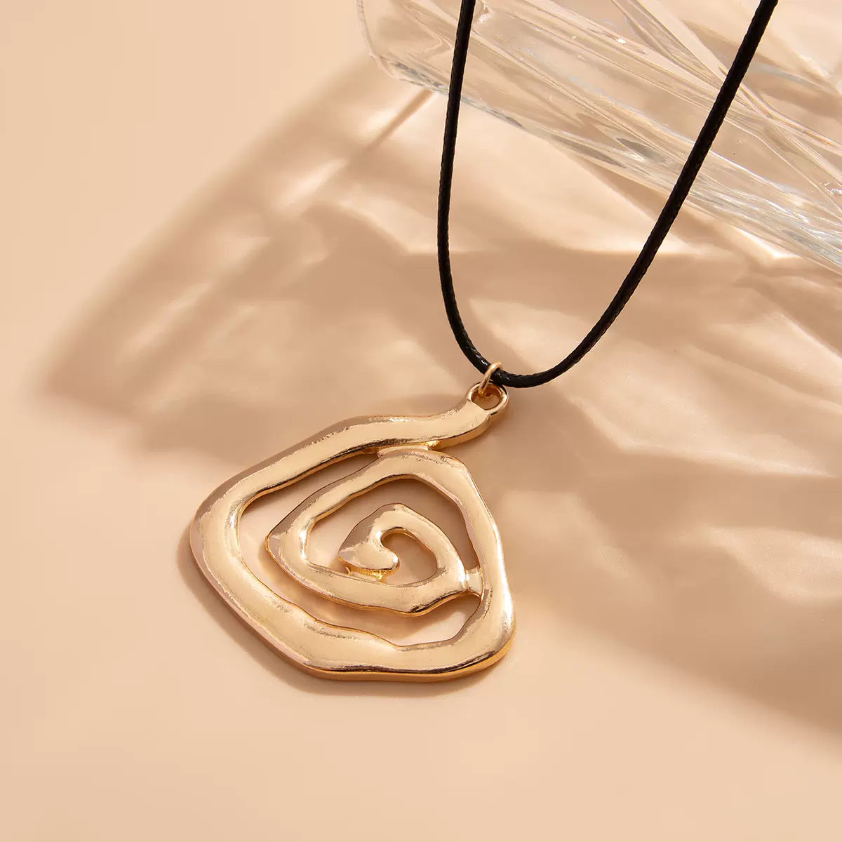 Missy Jewelry - Aloni Swirl Pendant Cord Necklace - Gold Oval Swirl Necklace Color