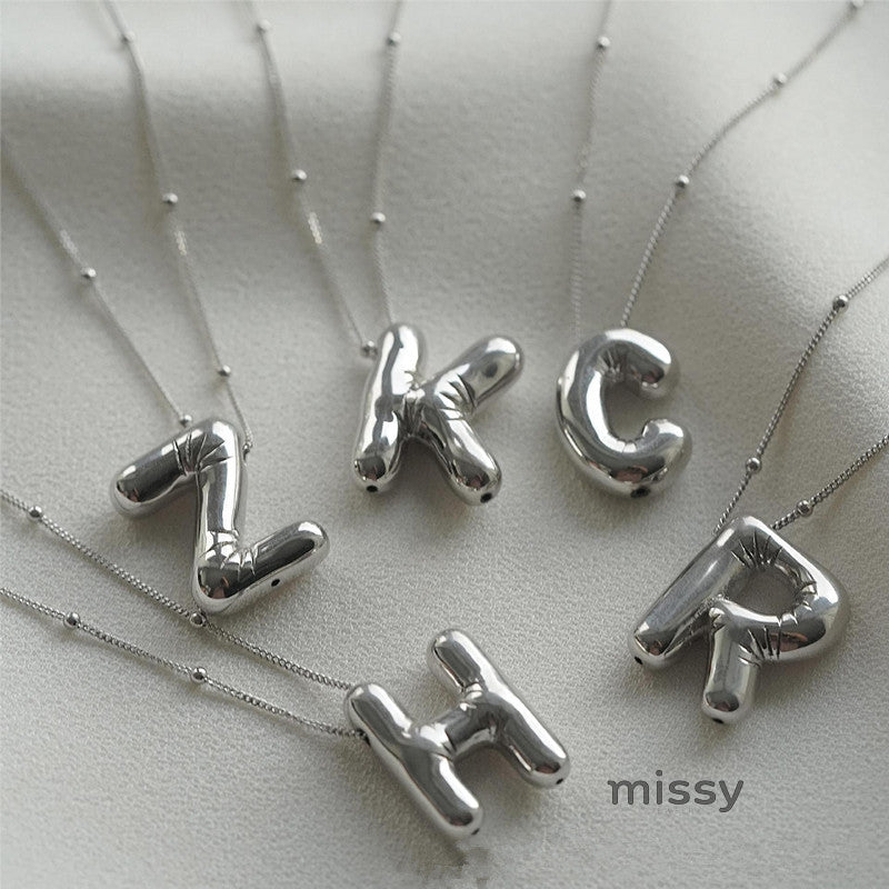 Aiyanah Glossy Bubble Letter Necklace [NHRD38ER]