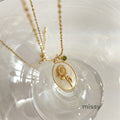 Anslee Mother-of-Pearl Birth Flower Necklace [J30YA0NJ]
