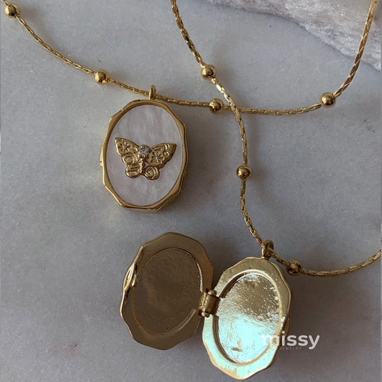 Avyanna Golden Butterfly Locket Necklace [3XXYBK7T]