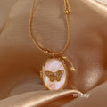 Avyanna Golden Butterfly Locket Necklace [TM8MRYV7]