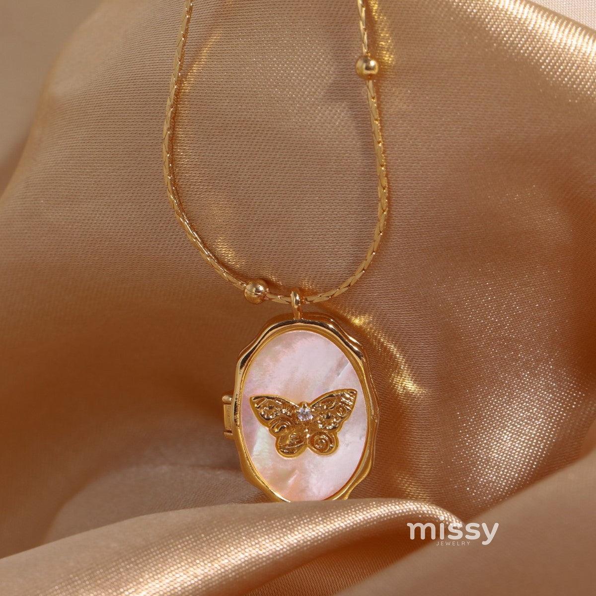 Avyanna Golden Butterfly Locket Necklace [TM8MRYV7]