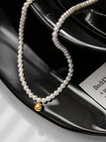 Crystal Pearl and Gold Ball Necklace [NV8C3JZZ]