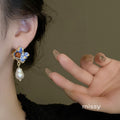 Deisy Irregular Pearl Earrings [E36U28RO]