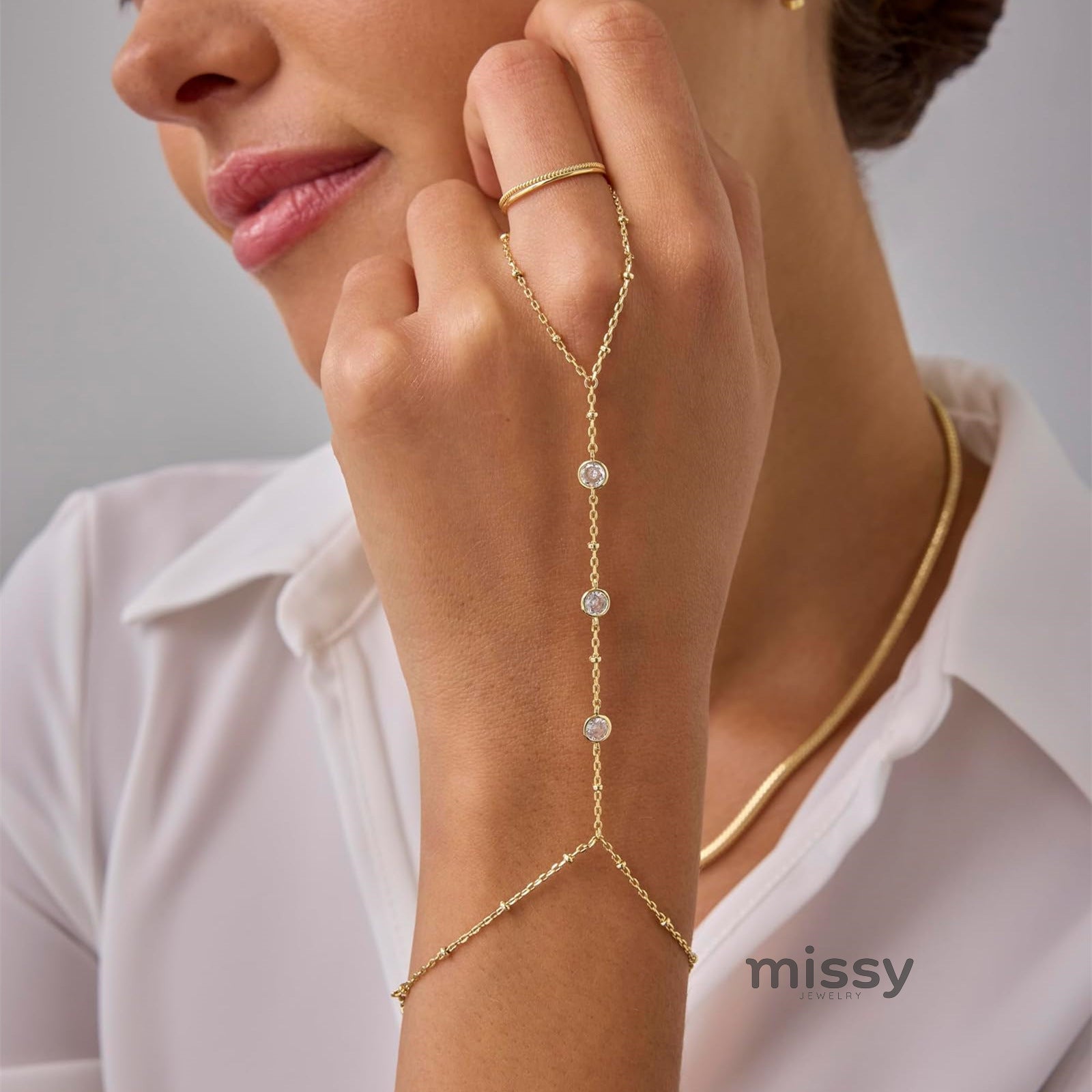 Elliette Gold Plated Finger Chain Bracelet [WW9MC303]