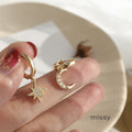 Haset Star Moon Asymmetric Earrings [MFA8GFCW]