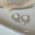 Irena Sculpted Knot Earrings [0HMCHAS4]