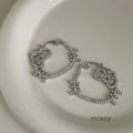 Isley Zircon Cat Bow Earrings [REAZUOO3]