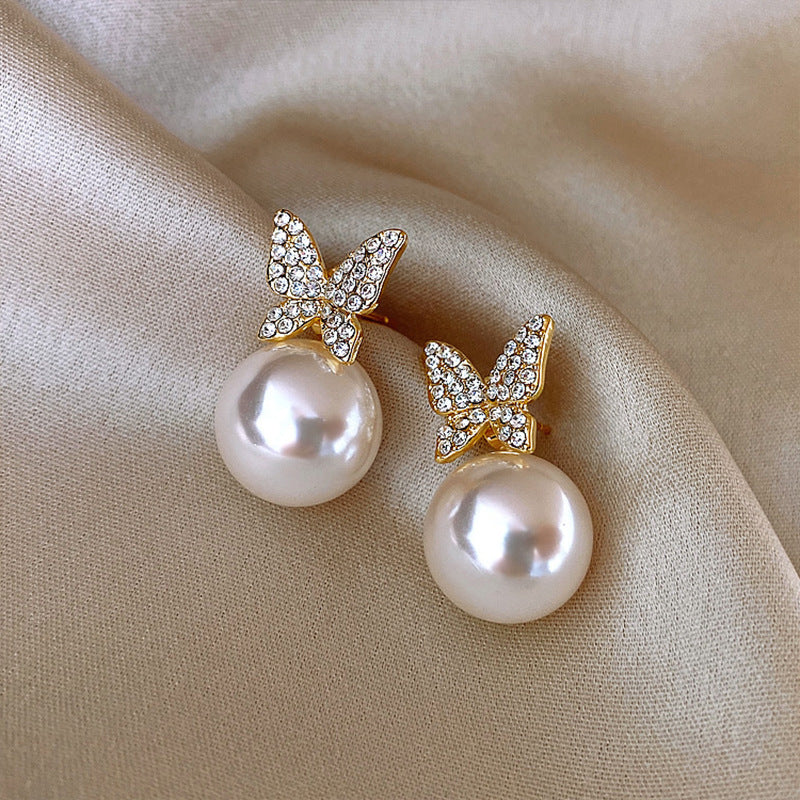 Izabell Butterfly Pearl Stud Earrings [56KSYD96]