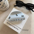 Jaiyana Striped Bow Claw Clip