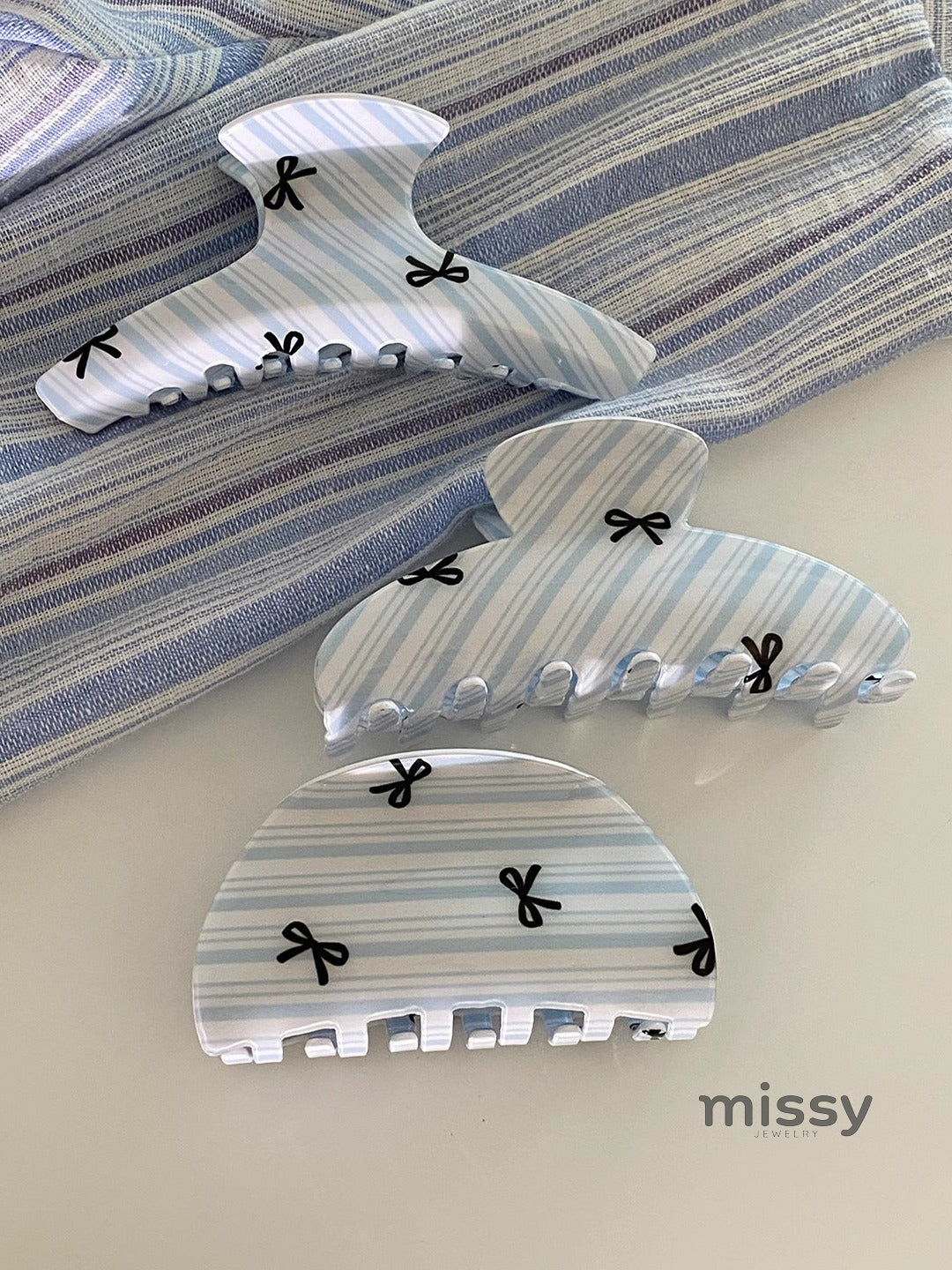 Jaiyana Striped Bow Claw Clip