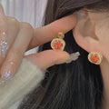 Jolynn Hollow Garnet Zircon Earrings [Z4TDCNNN]