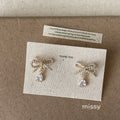 Kelcie Pearl Bow Drop Earrings [NTLOGE7J]