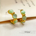 Kooper Green Cat Eye Hoops [DE1OPFAW]