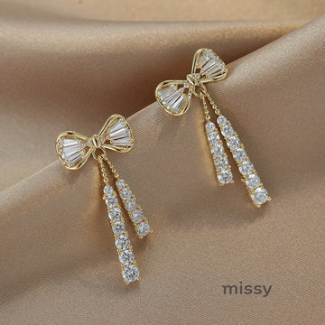 Macee Gold Zircon Bow Earrings [O5JJ49GK]