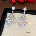 Maelee Zircon Feather Drop Earrings [TBROH0R1]