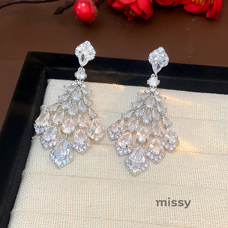 Maelee Zircon Feather Drop Earrings [TBROH0R1]