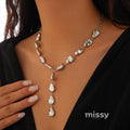 Maribel Cross Tassel Necklace