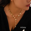 Maribel Cross Tassel Necklace