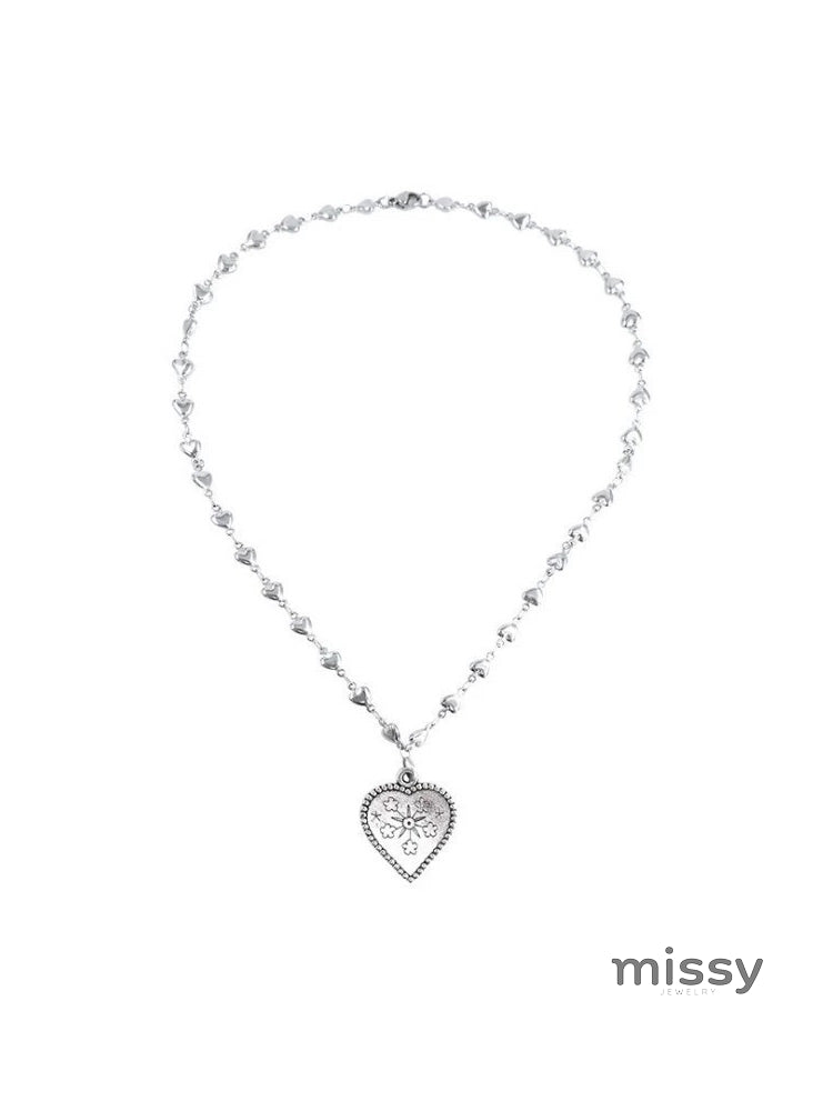 Maysa Vintage Carved Snowflake Necklace