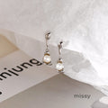 Melonie Asymmetric Pearl Earrings [URGCTW5J]