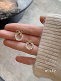 Nayah Pearl Bow Earrings