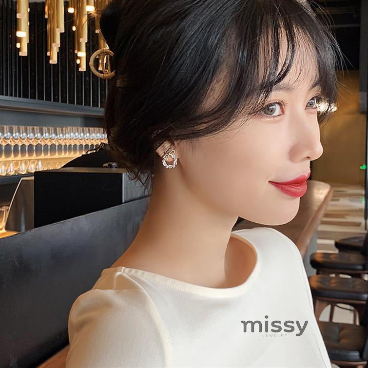 Nayah Pearl Bow Earrings