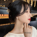 Nayah Pearl Bow Earrings