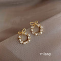 Nayah Pearl Bow Earrings