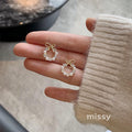 Nayah Pearl Bow Earrings
