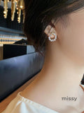 Nayah Pearl Bow Earrings