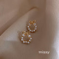 Nayah Pearl Bow Earrings