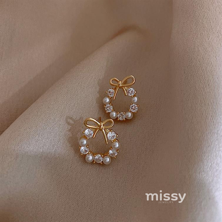 Nayah Pearl Bow Earrings