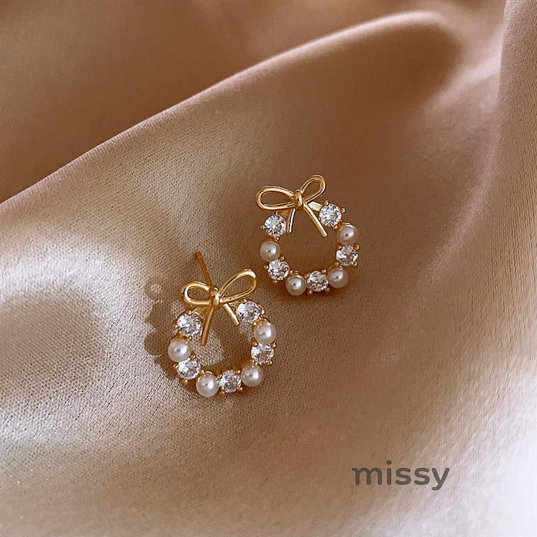 Nayah Pearl Bow Earrings