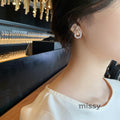 Nayah Pearl Bow Earrings