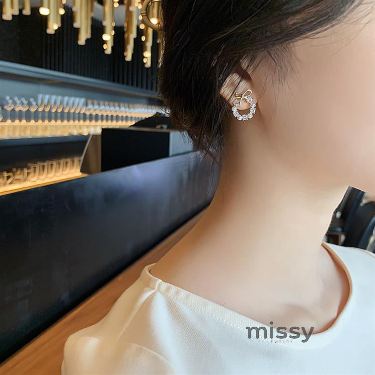 Nayah Pearl Bow Earrings