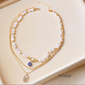 Neha Layered Eye Pearl Necklace [FWCK2BZK]