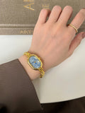 Oval Mother-of-Pearl Bracelet Watch [00KX0AW3]