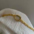 Oval Mother-of-Pearl Bracelet Watch [J934HEHC]