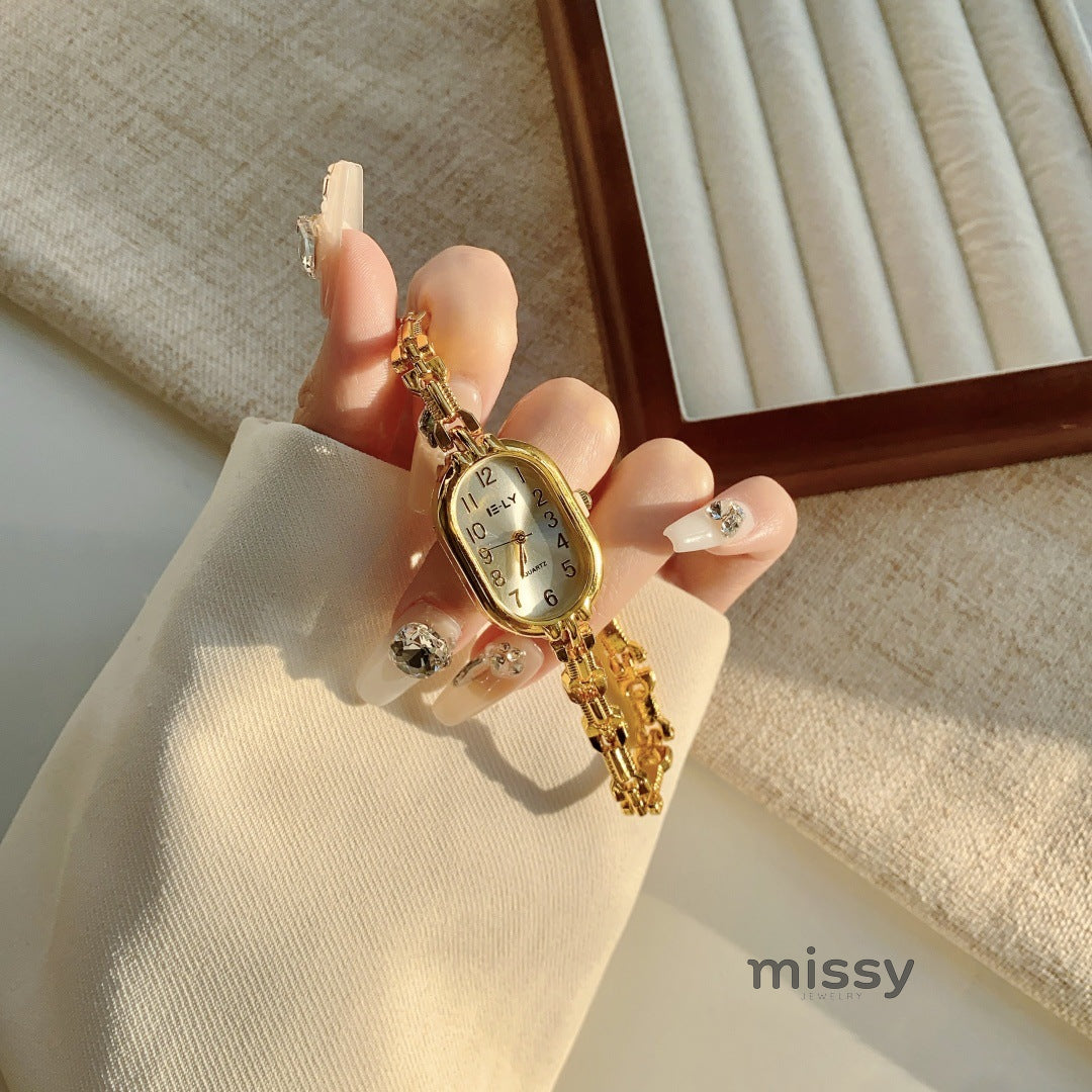 Parnika Gold Rectangle Watch [1IBG9TX8]