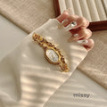 Parnika Gold Rectangle Watch [F5O1TQKC]